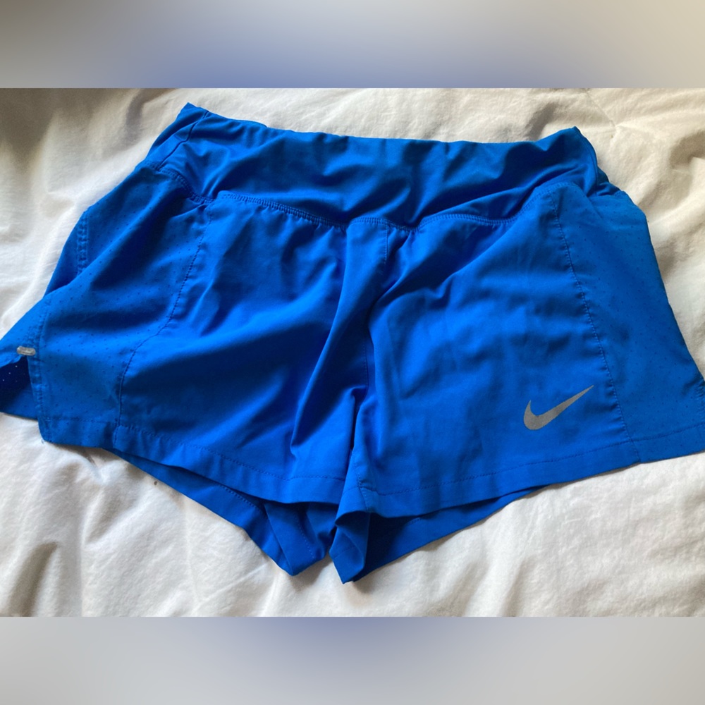 Blue nike running shorts